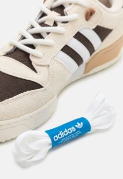 Adidas Originals Rivalry Unisex - Trainers - White/Footwear White/Dark Brown -Trend Fusion Shop 45697989ee17434bba499bb016f5eca6
