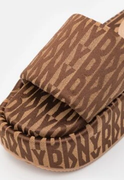 DKNY Vyra Platform Slide - Heeled Mules - Saddle/New Nude -Trend Fusion Shop 8f625af3f2444b59ba2f975af8c296bd