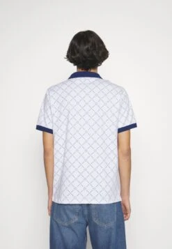 Ellesse Couramento - Polo Shirt - White -Trend Fusion Shop ad30f182c9a148df8bfabf07a150a28a