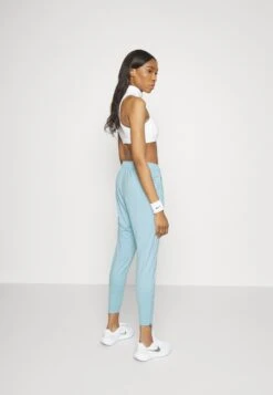 Nike Performance Essential Novelty Pant - Tracksuit Bottoms - Ocean Bliss/Silver 7 Nike Performance Essential Novelty Pant - Tracksuit Bottoms - Ocean Bliss/Silver -Trend Fusion Shop ffa0419c71c6404dbf20e33c46703c6e